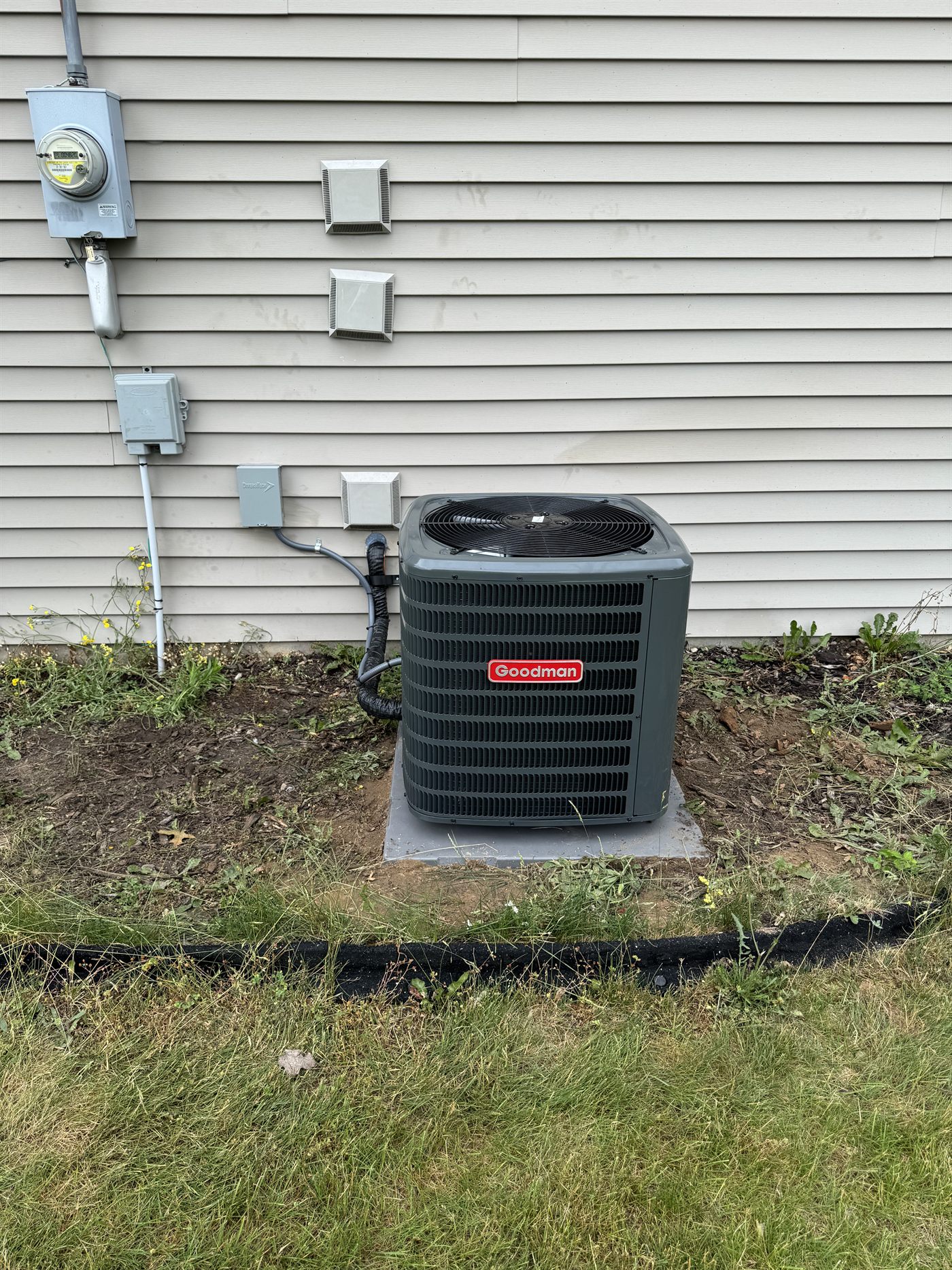 Outdoor Goodman air conditioner installed by JT's Heating Cooling and Plumbing